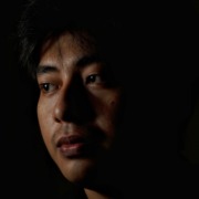 Oriental Man heru-dharma–IQZ2qiC-Vs-unsplash CRP Portrait of a highly sensitive Christian man emerging from shadow into light, symbolizing emotional healing, profound forgiveness, and inner peace.