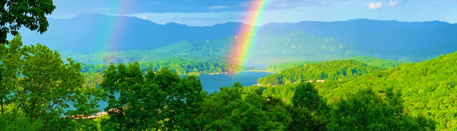 Lake Chatuge in the Georgia Blue Ridge Mountains with a double rainbow, venue for our HSP Retreat.