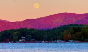 Full moon rising over the Blue Ridge Mountains and Lake Chatuge in Young Harris, Georgia.