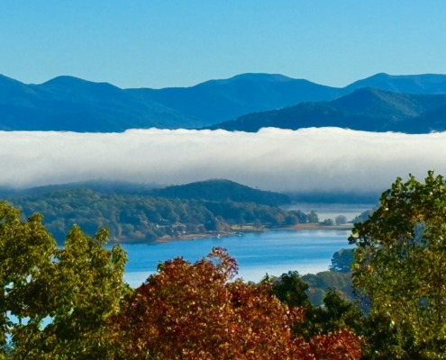 Panoramic view of white low-lying cloud over Lake Chatuge and the Blue Ridge Mountains in Young Harris, Georgia.