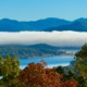 Panoramic view of white low-lying cloud over Lake Chatuge and the Blue Ridge Mountains in Young Harris, Georgia.