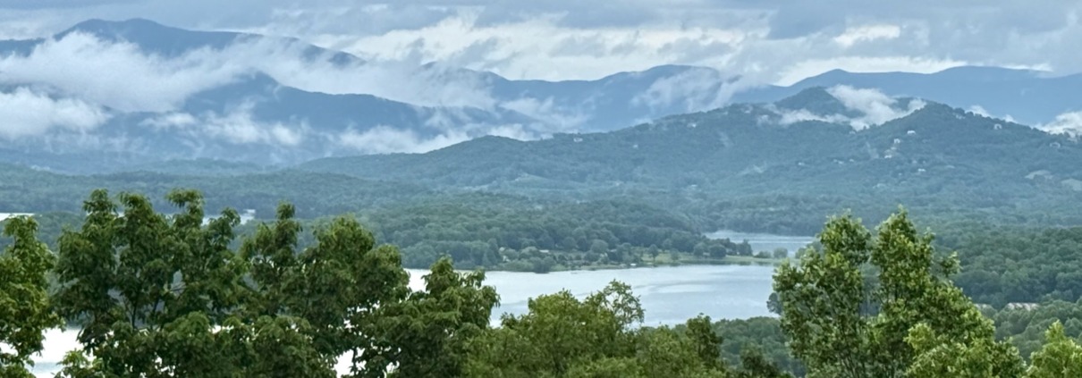 Panoramic mountain landscape of Lake Chatuge in Young Harris GA for a highly sensitive person (HSP) retreat focused on emotional healing.