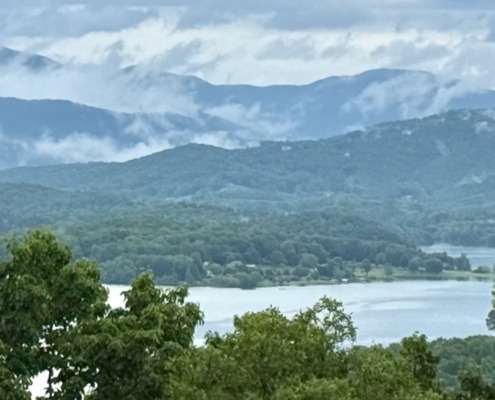 Panoramic mountain landscape of Lake Chatuge in Young Harris GA for a highly sensitive person (HSP) retreat focused on emotional healing.