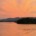 Panoramic orange sunset over Lake Chatuge and the Blue Ridge Mountains near Young Harris, Georgia.