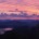 Panoramic view of a soft pink and purple dawn sky over Lake Chatuge and the Blue Ridge Mountains in Young Harris, Georgia.