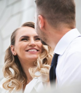 A loving couple sharing a warm, emotionally connected moment, perfectly illustrating the healthy communication and intimacy achieved through HSP relationship coaching with Benita A. Esposito